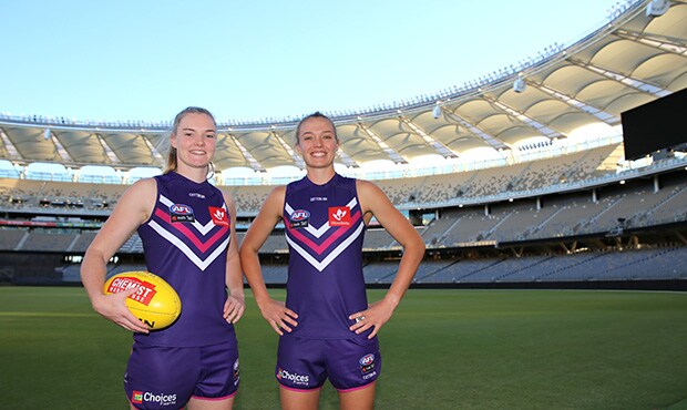 miller antonio web 12.jpg Hayley Miller and Ebony Antonio are ready to run out at Optus Stadium. - AFLW,Fremantle,Fremantle Dockers